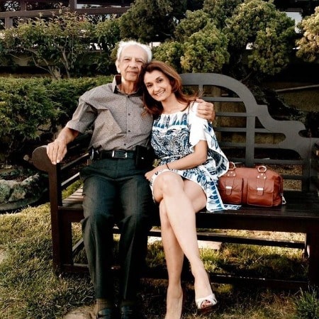 A smiling Picture of Anjali Bhimani with her father Bharat Bhimani.